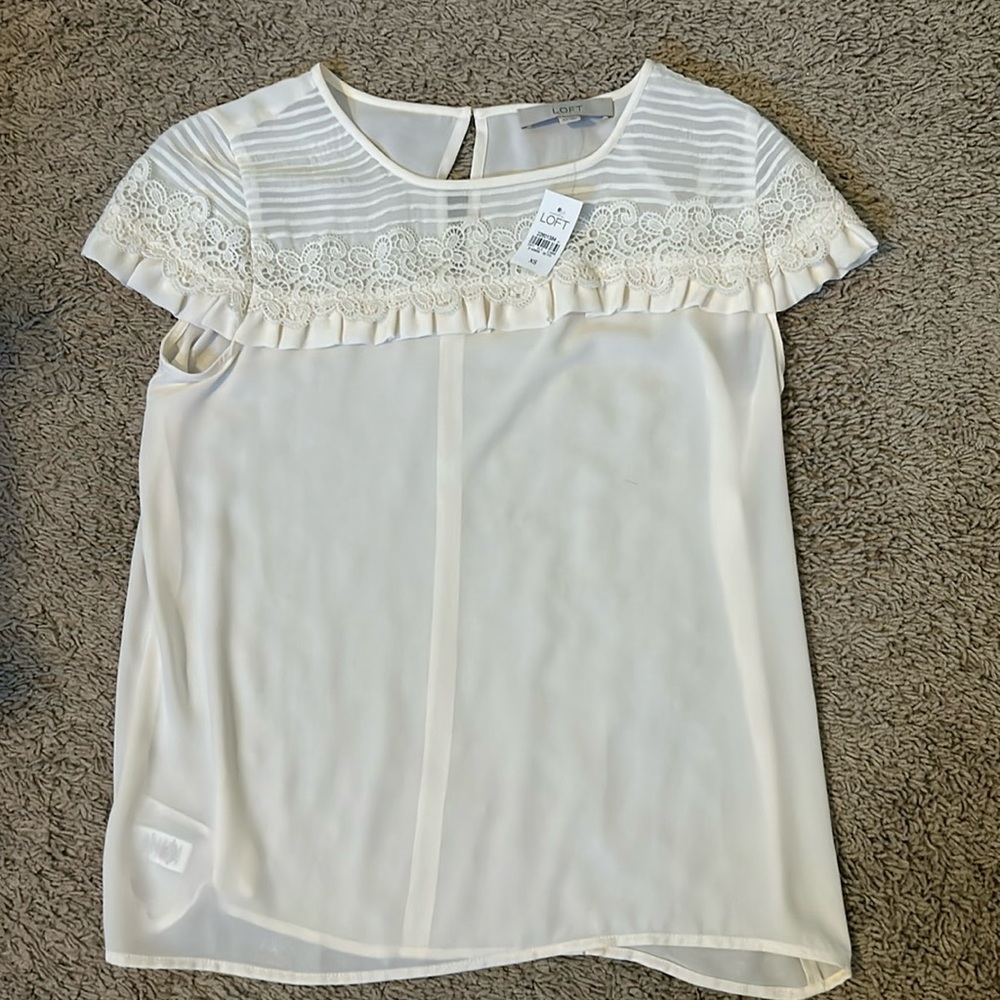 Ivory blouse with beautiful detail